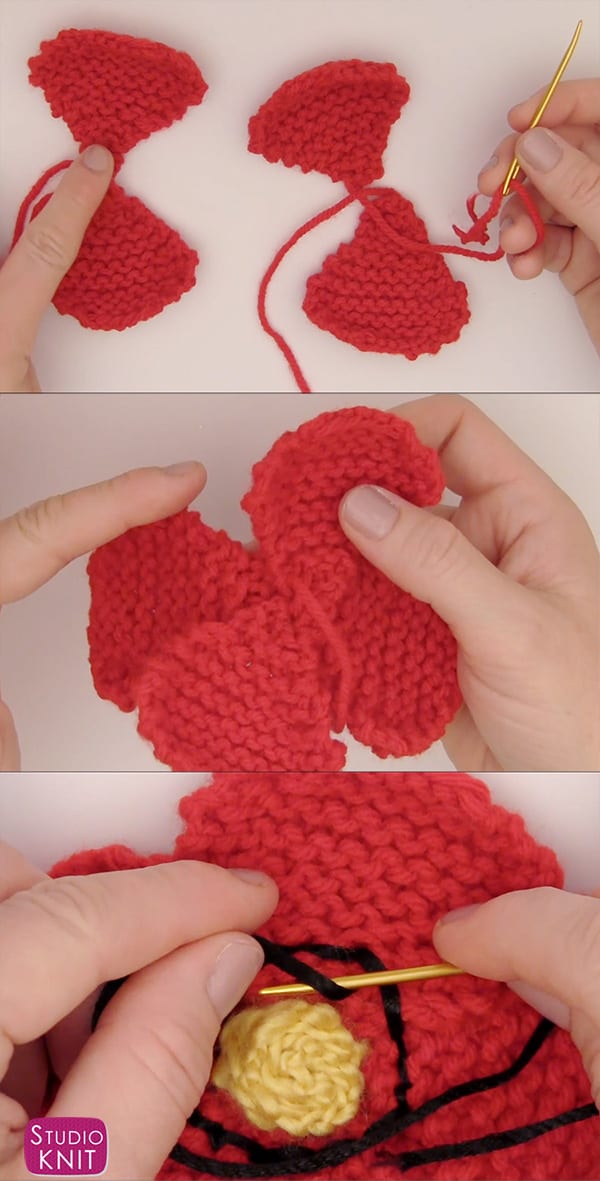 Hands constructing poppy knitted flowers by tacking together petals with yarn and a tapestry needle, and embroidering the details
