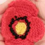 So pretty! Learn how to Knit a Poppy Flower with Easy Free Knitting Pattern + Video Tutorial by Studio Knit.