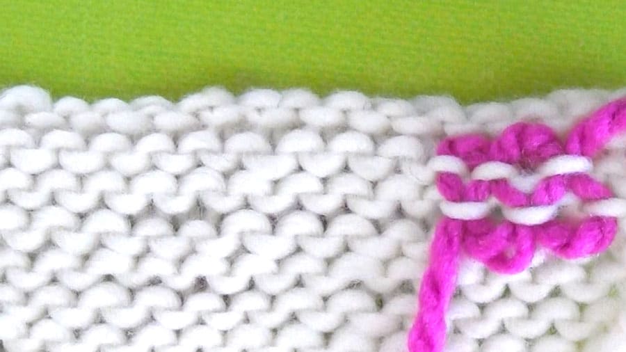 Learn How to WEAVE IN ENDS in the Absolute Beginner Knitting Series by Studio Knit