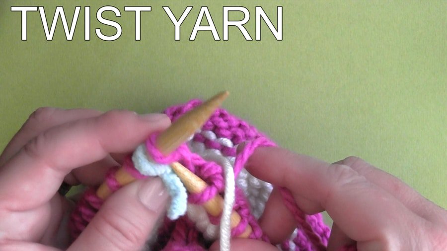 Knitting with pink yarn.