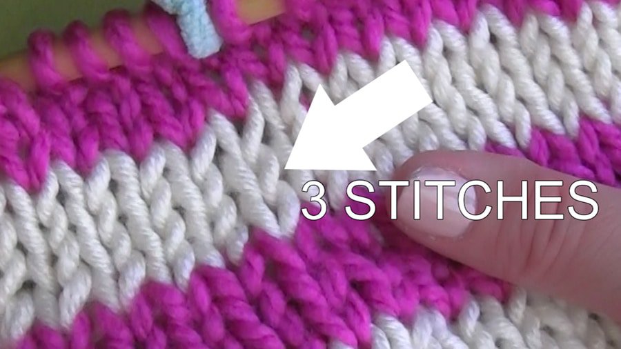 A close up of stitches that are jogless on circular knitting needles.