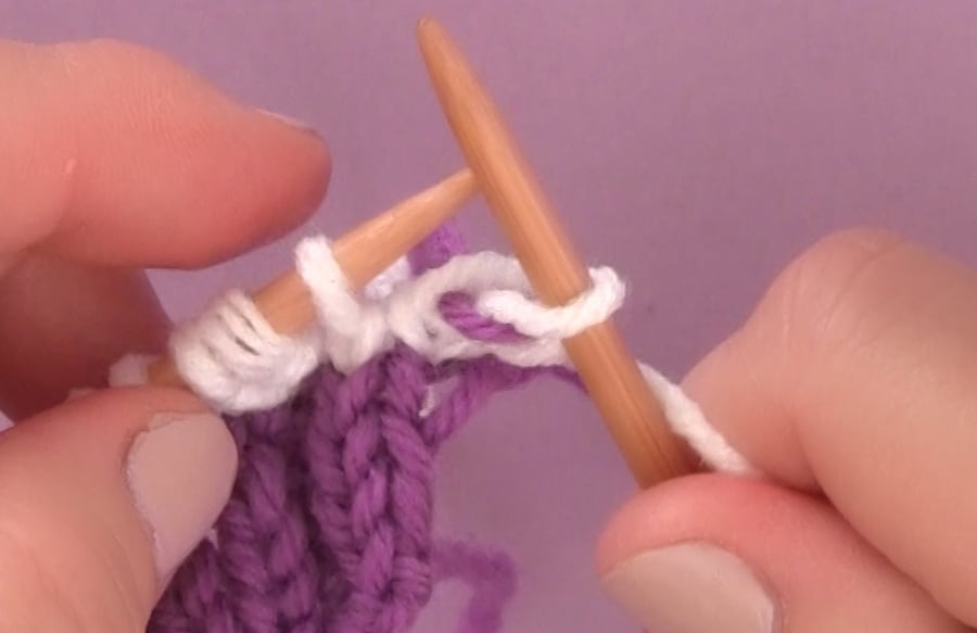 How to Carry and Twist Yarn Colors - Knit Stripes with Studio Knit