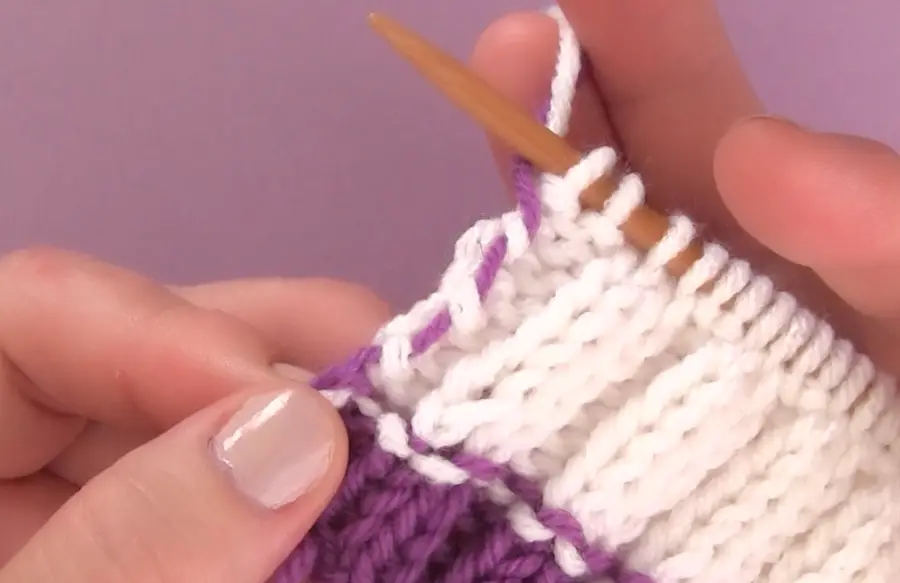 How to Carry and Twist Yarn Colors - Knit Stripes with Studio Knit