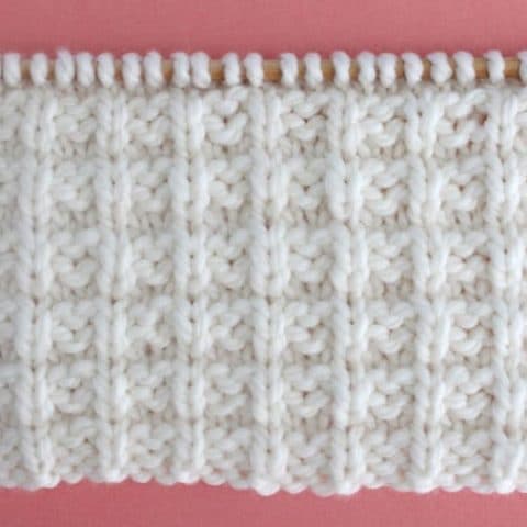 Waffle Knit Stitch Pattern. Get Free Written Patterns, Charts, and Video Tutorials in the Absolute Beginner Knitting Series by Studio Knit.