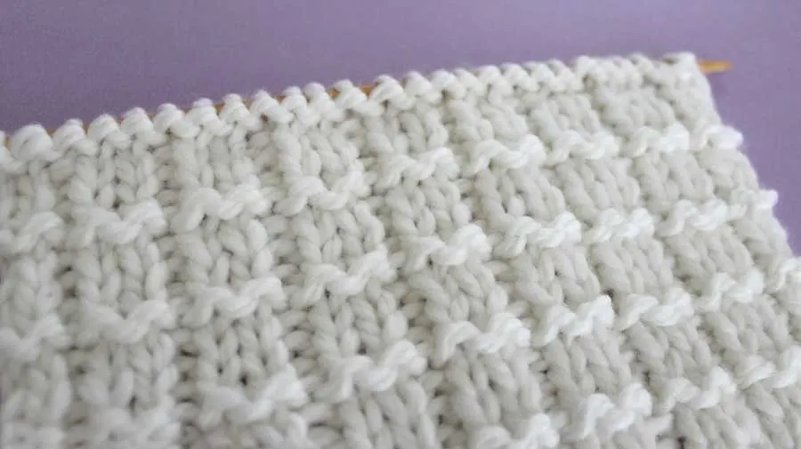 Side View of Pique Rib Knit Stitch Pattern by Studio Knit with Free Pattern and Video Tutorial