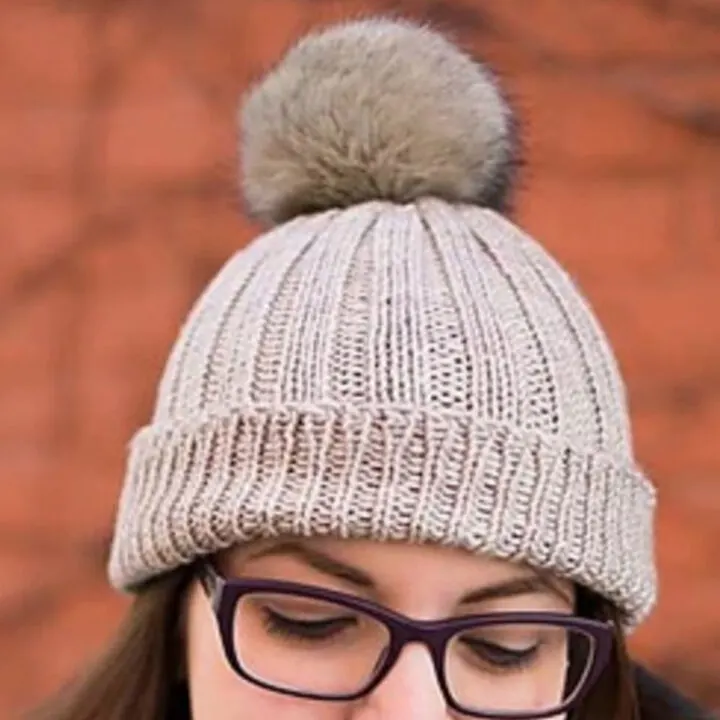 Knitted Ribbed Hat in Grey yarn color with faux fur pom pom
