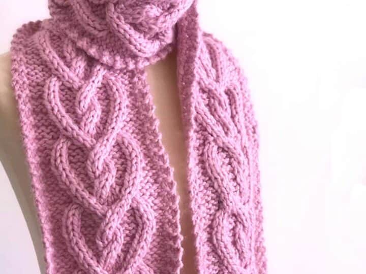 Heart Cable Knit Scarf in Pink Wool Yarn on Dress Form