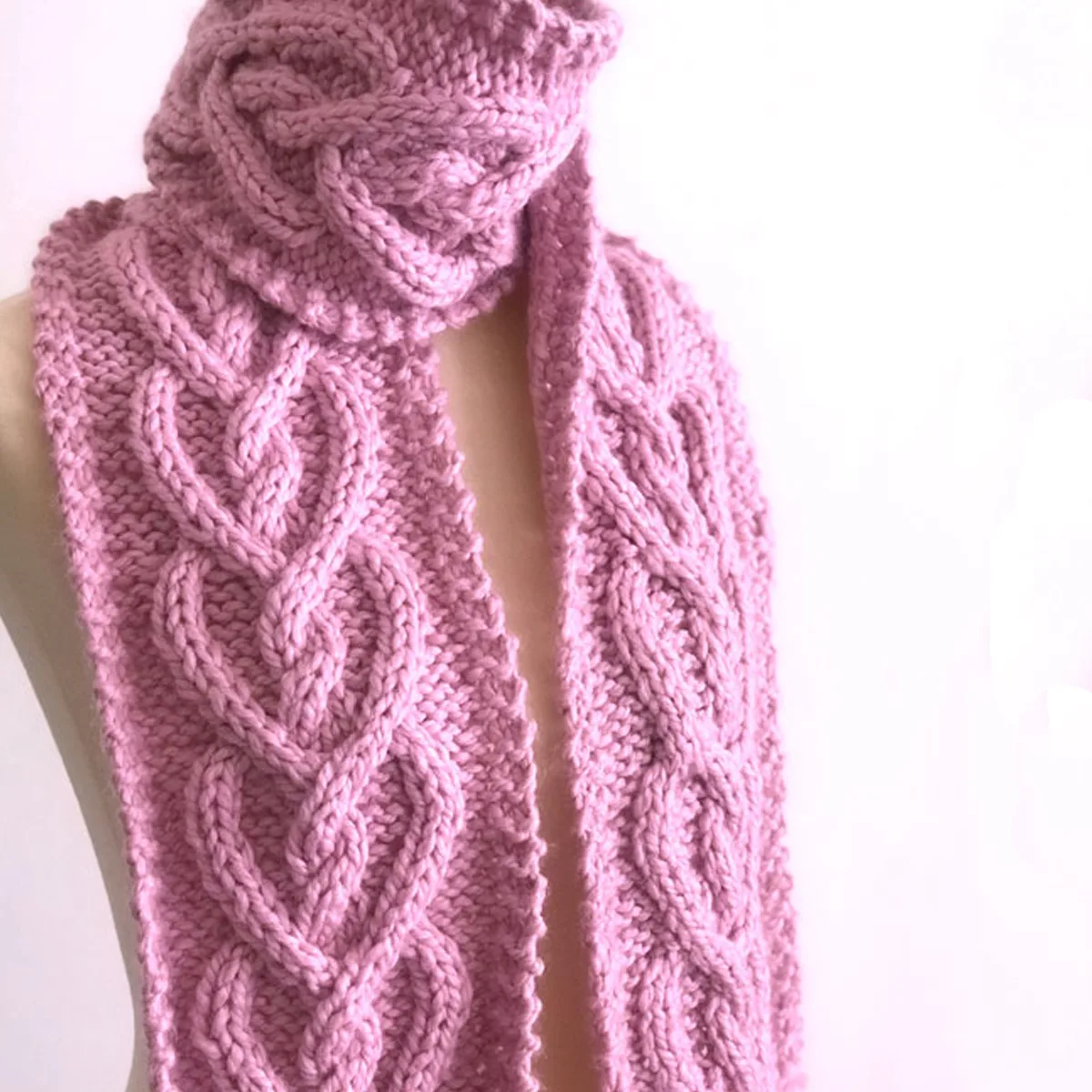 Heart Cable Knit Scarf in Pink Wool Yarn on Dress Form