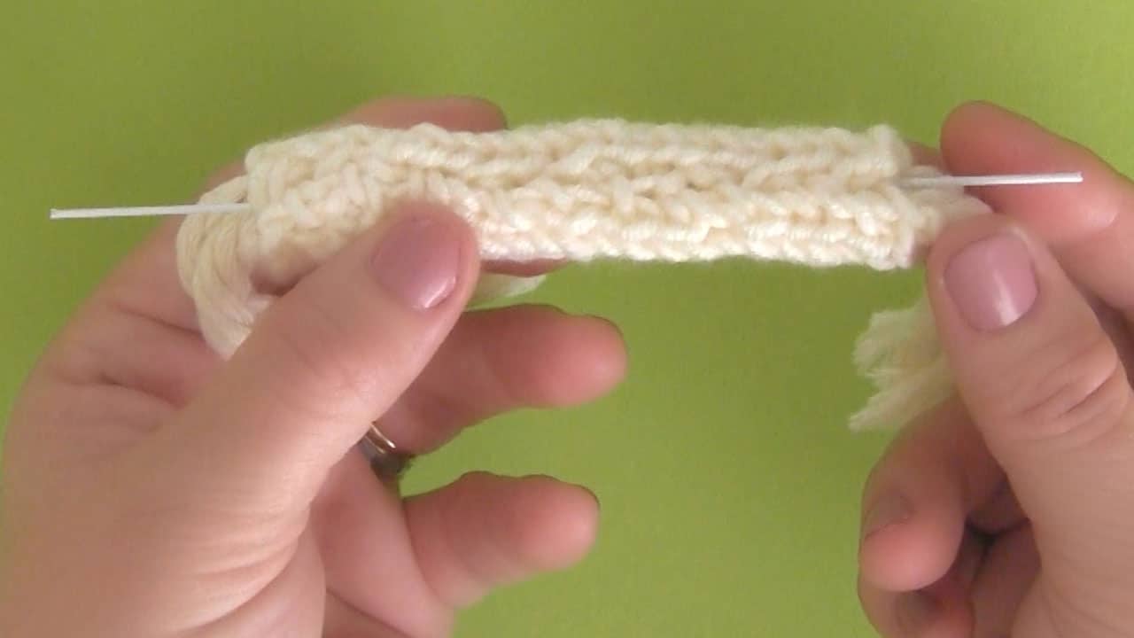 inserting wire into knitted layer