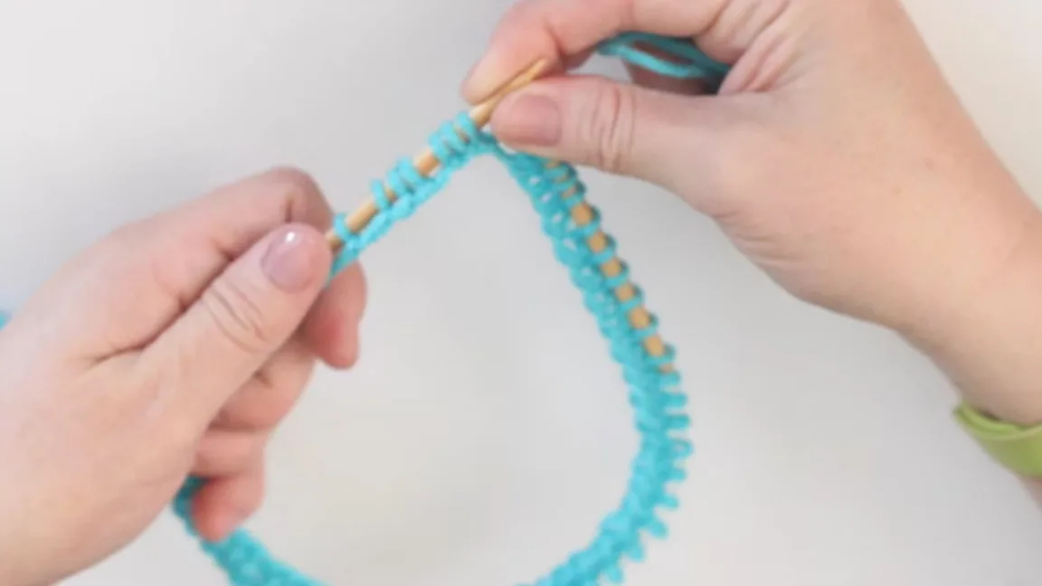 Knit and Scootch technique demonstration while knitting on circular needles.