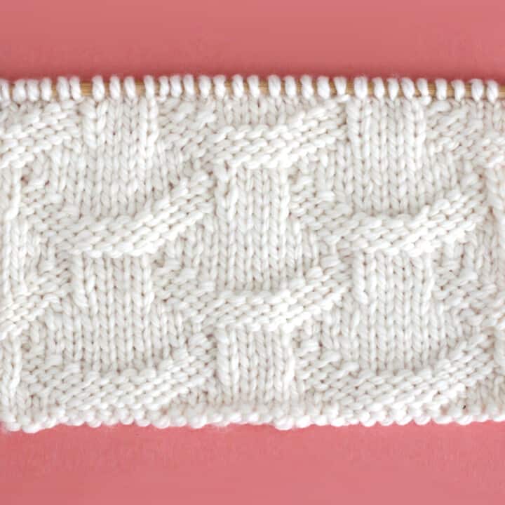 Knit Basket Loop Stitch Pattern with white color yarn on straight knitting needle.
