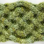Celtic Saxon Cable Knit Stitch Pattern in green color yarn.