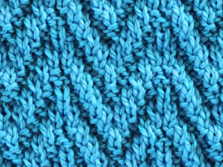 Chevron Rib Knit Stitch Pattern in blue yarn color.