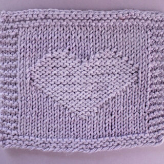 Heart Stitch Knitting Pattern in purple yarn color for dishcloth.