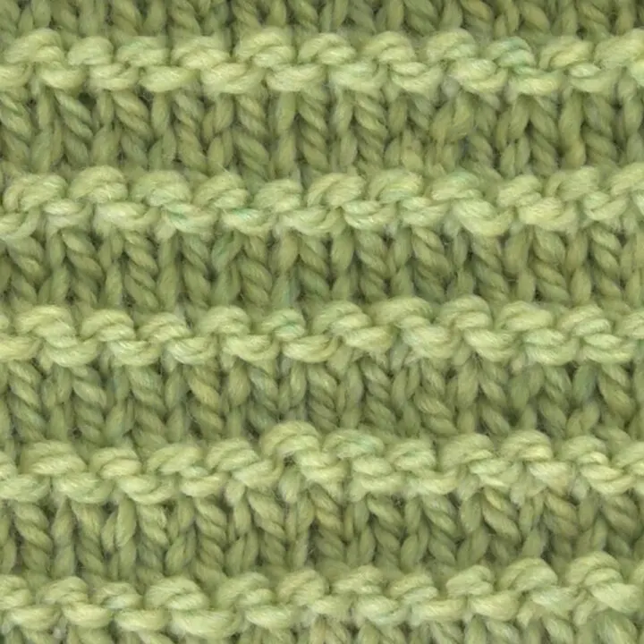 Purl Ridge Knit Pattern Texture in green yarn color.