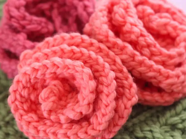 Knitted Rose shapes in peach and pink color yarn