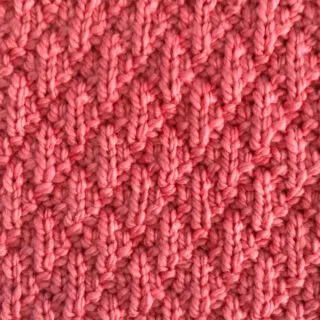 Seersucker Stitch Knitting Pattern in pink yarn color.