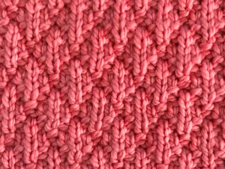 Seersucker Stitch Knitting Pattern in pink yarn color.