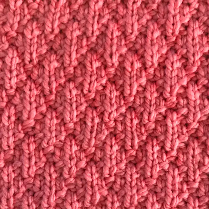 Seersucker Stitch Knitting Pattern in pink yarn color.