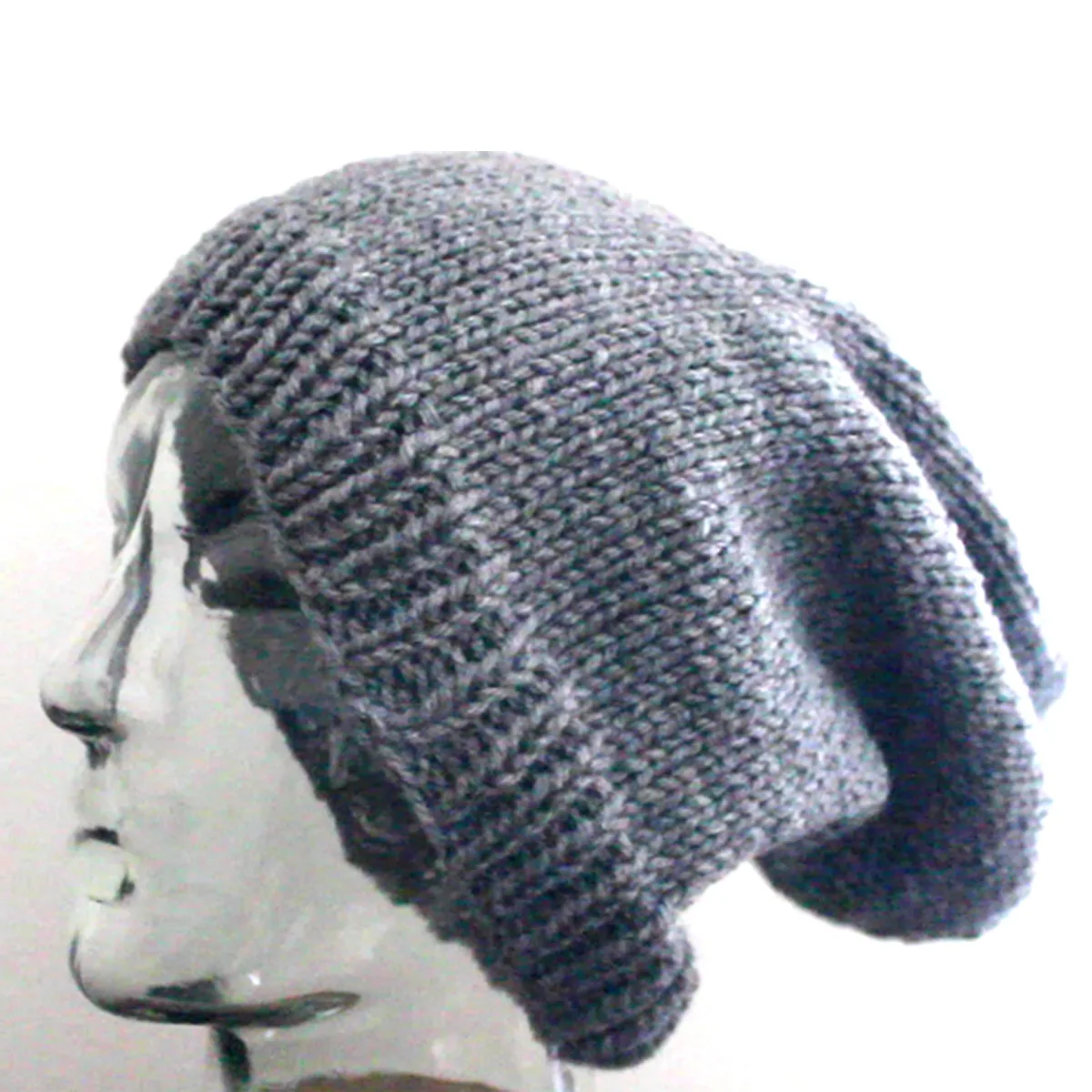 Slouchy Knitted Beanie Hat in Gray color yarn on mannequin head