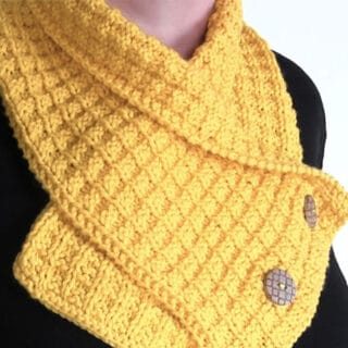Knitted Waffe Stitch Neck Warmer Scarf in yellow yarn color.