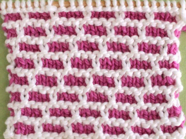 Brick Stitch Knitting Pattern in Pink and White Yarn Colors.