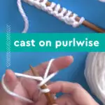 Hands demonstrating how to purlwise cast on with needles and yarn.