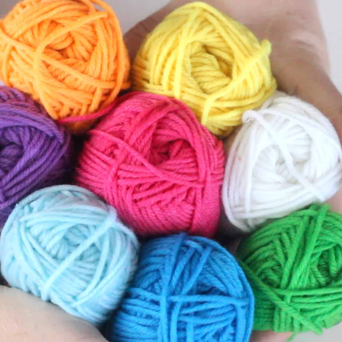 Balls of yarn in various colors of the rainbow.