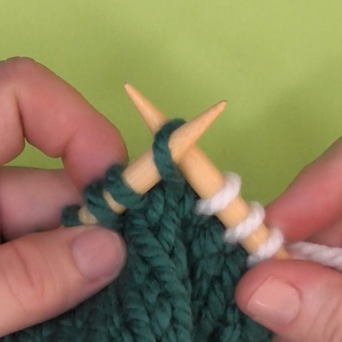 Insert needle into first loop knitwise.