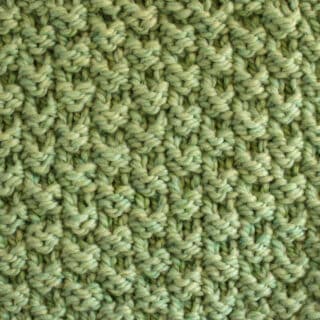 Double Moss Stitch Knitting Pattern in green color yarn.