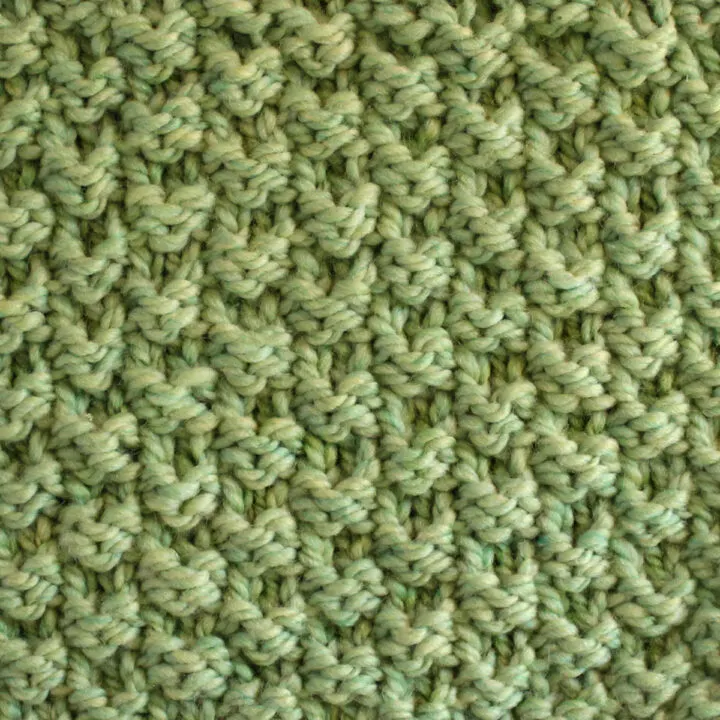 Double Moss Stitch Knitting Pattern in green color yarn.