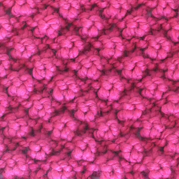 Raspberry Stitch knitted with pink color yarn.