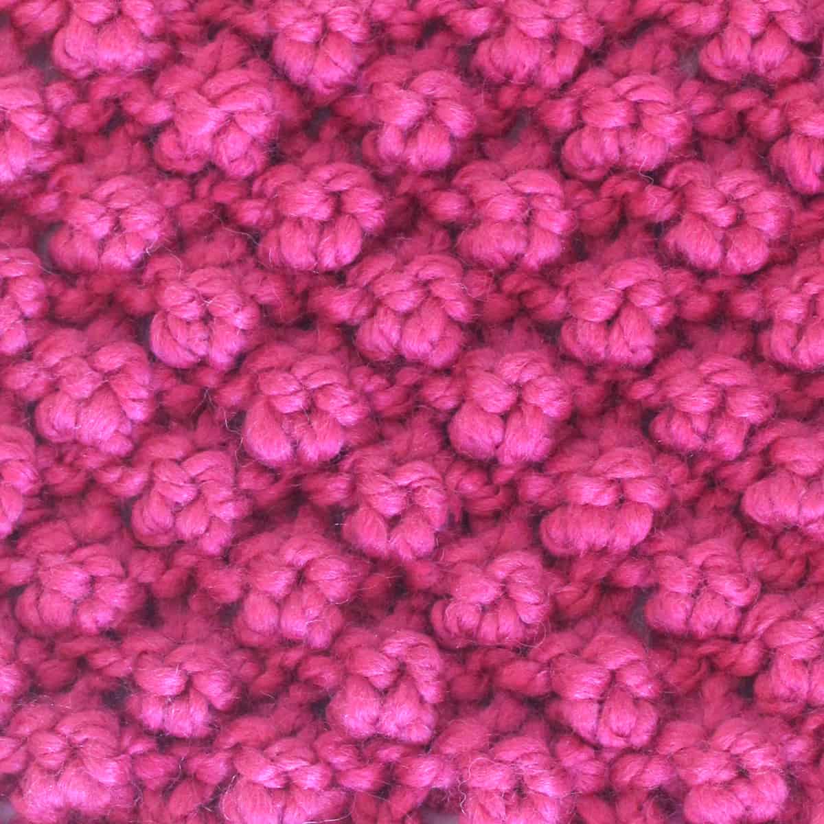 Raspberry Stitch knitted with pink color yarn.