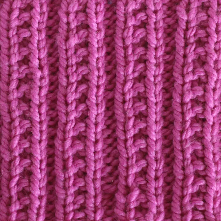 Beaded Rib Knit Stitch Pattern in pink color yarn.