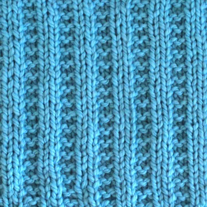 Garter Ribbing Knit Stitch Pattern in blue color yarn.