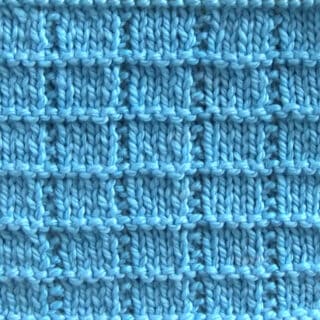 Tile Squares knit stitch pattern with blue colored yarn.