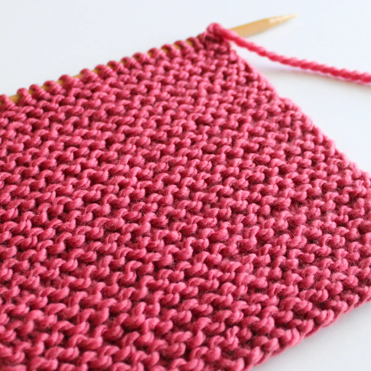 Garter stitch knitting pattern flat on straight knitting needles.