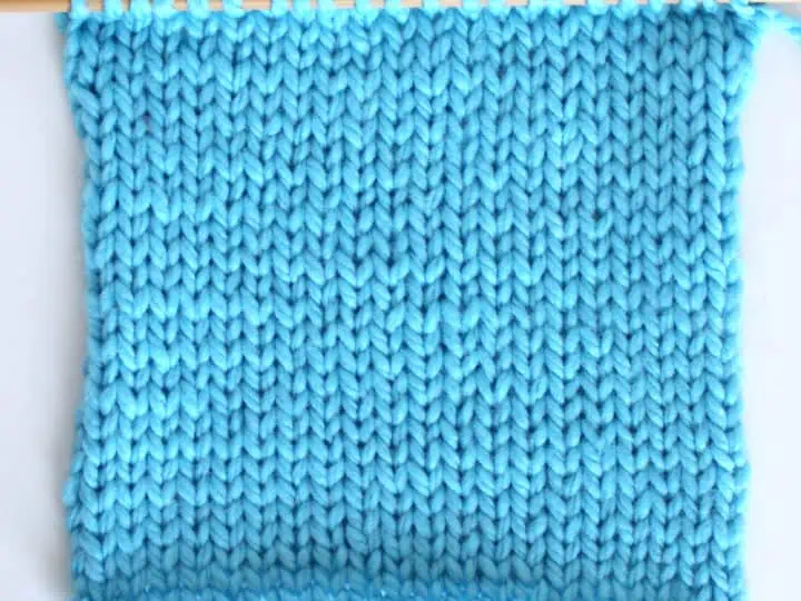 Stockinette stitch knitted flat on straight knitting needles.