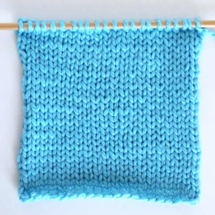 Stockinette stitch knitted flat on straight knitting needles.