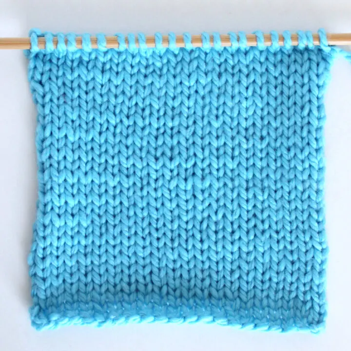 Stockinette stitch knitted flat on straight knitting needles.