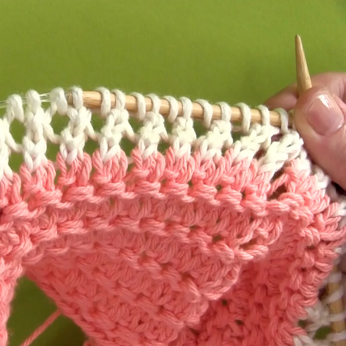 Knitting the first four rows of the mesh lace stitch for the market bag.