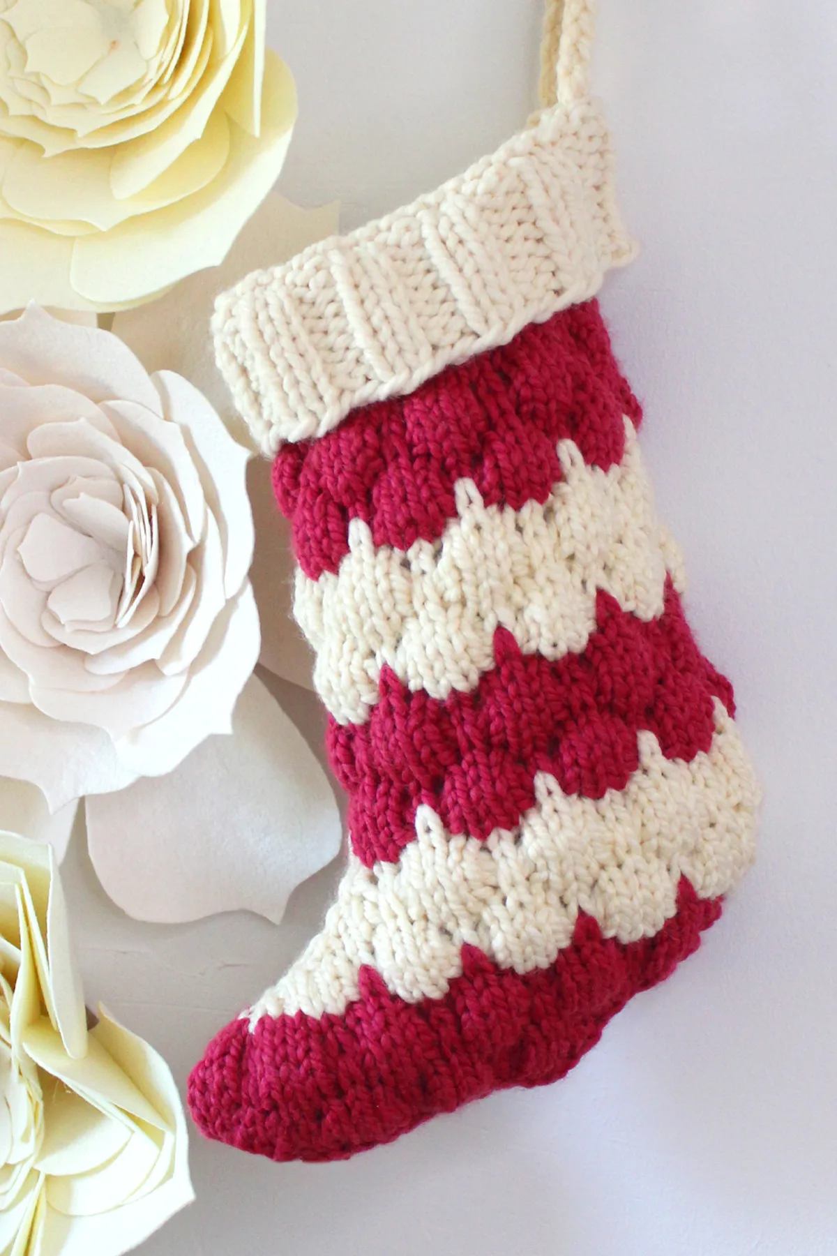 Bubble Christmas Stocking in red and white yarn colors by Studio Knit.