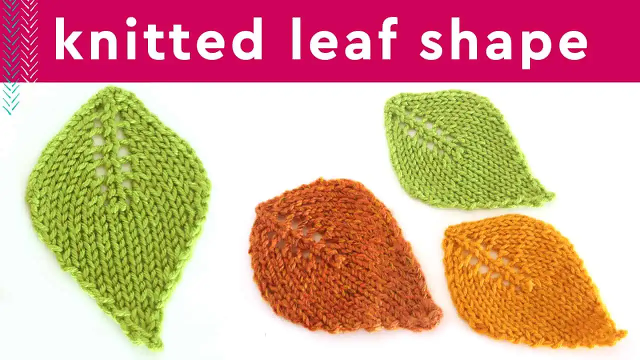 Knitted leaf shape with knitted leaves in green, brown, and yellow yarn colors.