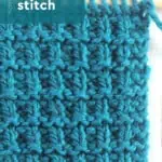 Hurdle stitch texture knitted with blue colored yarn on wooden needle by Studio Knit.