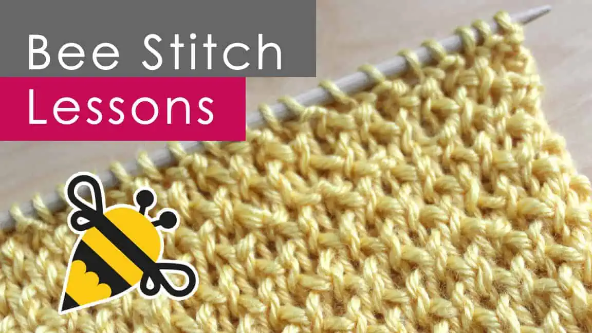 Bee stitch lessons knitted in yellow colored yarn with bee drawing.