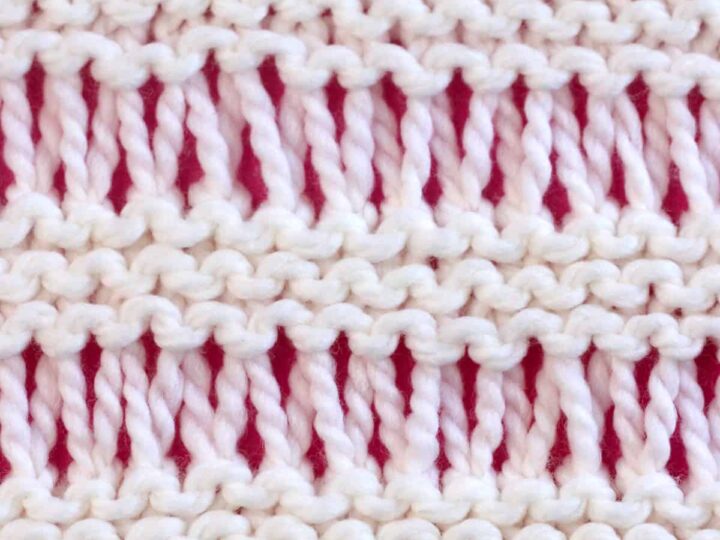 Garter Drop Stitch knitting texture in white yarn color.