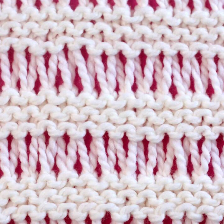 Garter Drop Stitch knitting texture in white yarn color.
