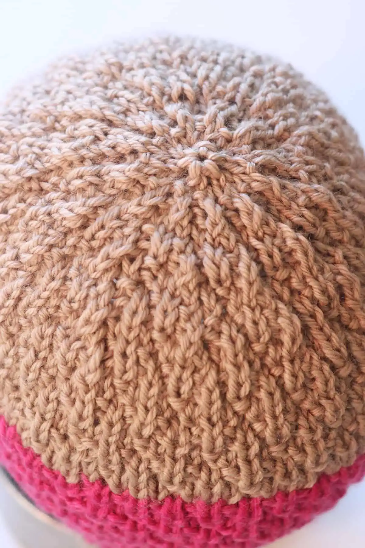 Crown decrease of the Seersucker Hat in light brown colored yarn.