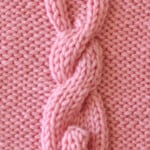 Bunny Cable knitting square in pink yarn color.