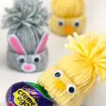 Yarn craft chicks and bunnies with a cadbury creme egg.